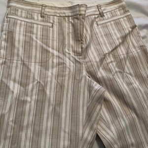 Tory Burch ankle pants, straight legs, sealed pockets in front. Pleats both side